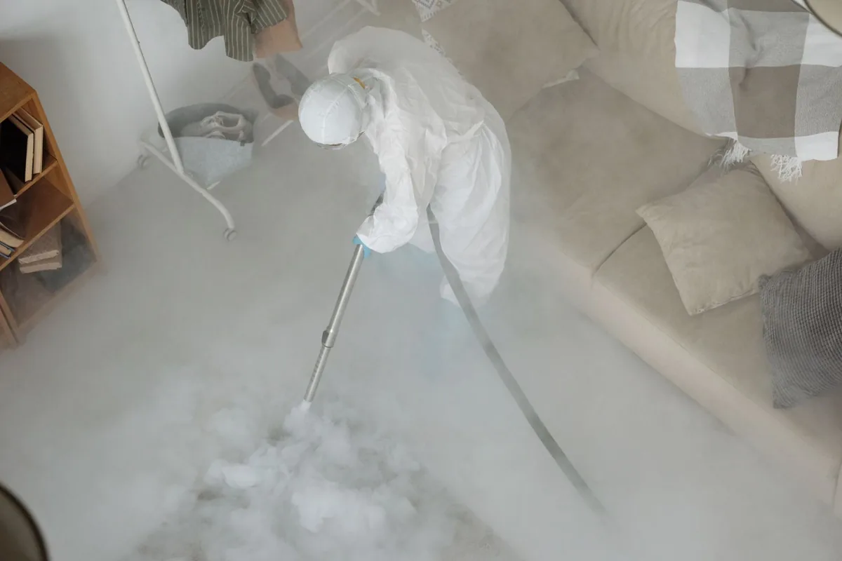 Biohazard cleanup technician in protective equipment, Mountain View, CA